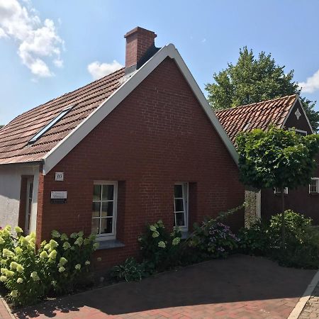 Ferienhaus Wattwurm Rysum Экстерьер фото