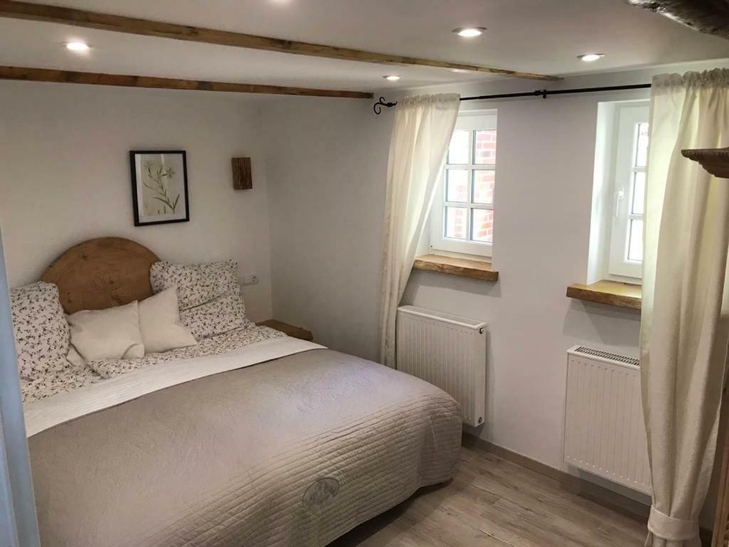 Ferienhaus Wattwurm Rysum Экстерьер фото