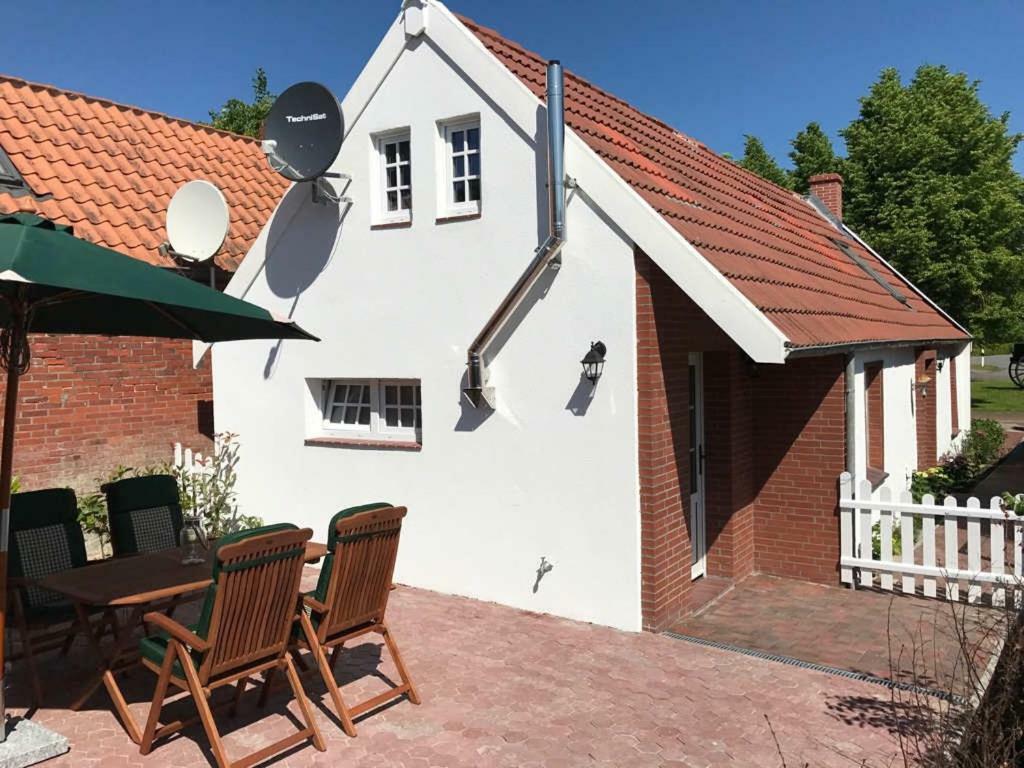 Ferienhaus Wattwurm Rysum Экстерьер фото