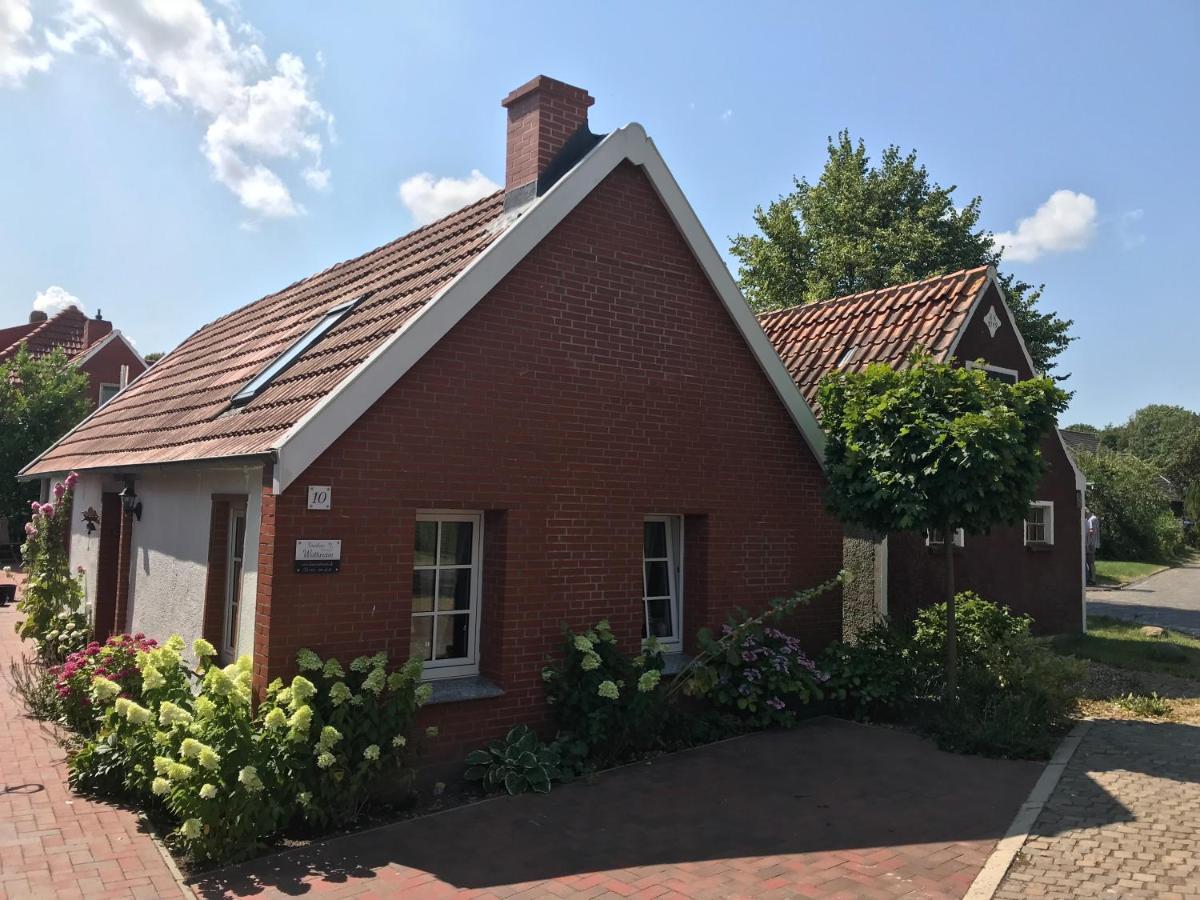 Ferienhaus Wattwurm Rysum Экстерьер фото